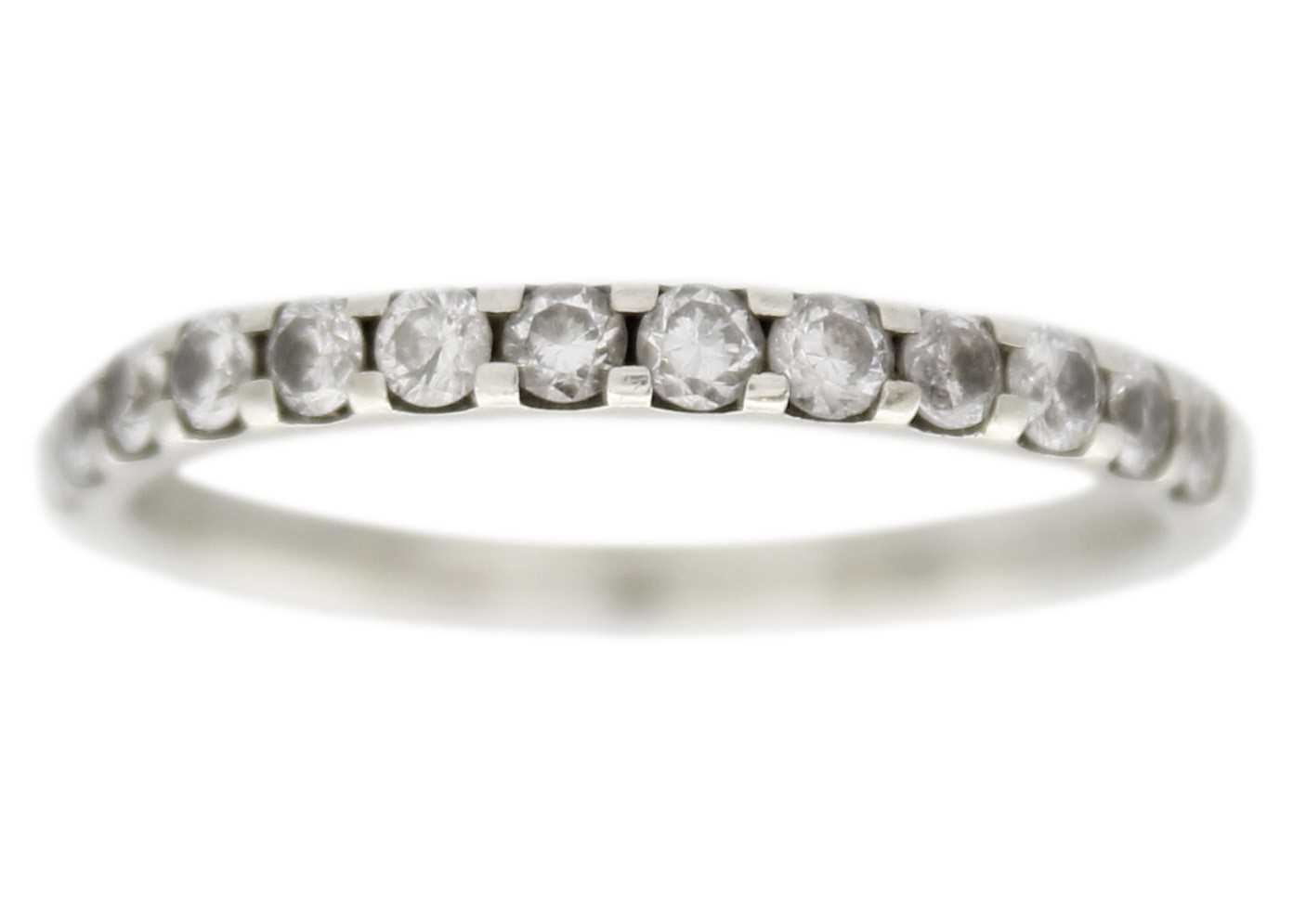 A 9ct white gold diamond half eternity ring.