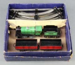 A Hornby O gauge clockwork locomotive tender, 2 trucks, quantity of rolling stock