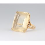 A yellow metal quartz dress ring 11.1 grams, size M