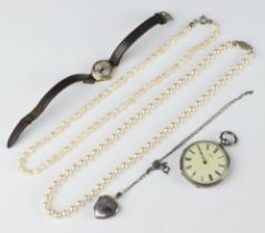 A lady's silver key wind fob watch, a lady's 9ct gold cased wristwatch on a leather strap, 2