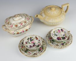 A pair of 19th Century Paris Porcelain cups and saucers decorated with butterflies and flowers