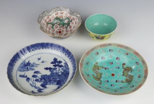 An 18th Century Chinese blue and white shallow dish 21cm, a yellow ground tea bowl 11cm, a scalloped