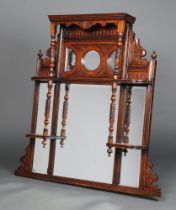 An Edwardian multiple plate over mantel mirror contained in a walnut frame with moulded cornice