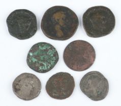 A collection of dupondius and other Roman coins dating from 100AD to 300AD