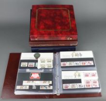 A collection of approx. 162 GB Elizabeth II presentation stamps contained in 3 albums, together with
