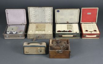 A collection of portable suitcase valve radios by Pye, Vidor and Marconi, together with an Ekco