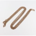 A yellow metal 9ct muff chain, 154cm, 38.9 grams