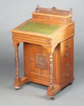 An Edwardian bleached mahogany Davenport, the back with stationery box and hinged lid, the