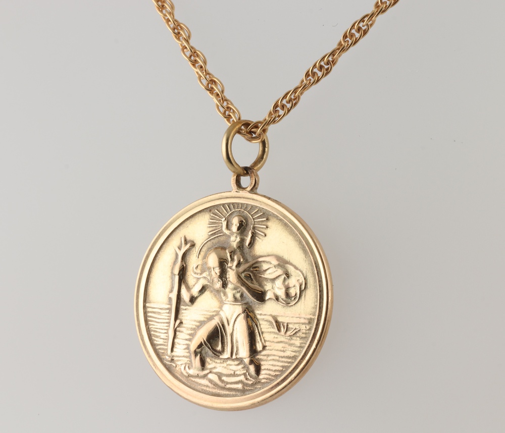 A 9ct yellow gold St Christopher pendant on a ditto 56cm chain, 8.1 grams