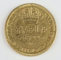 A four pound Brazil coin dated 1822, now gold plated