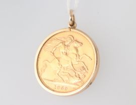 A sovereign 1959, in a 0.7 gram 9ct mount