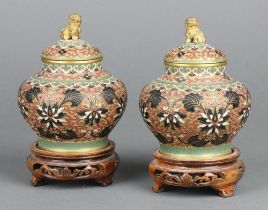 A pair of Japanese cloisonne enamelled urns and covers 11cm