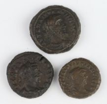 A group of three Roman coins minted in Alexandria