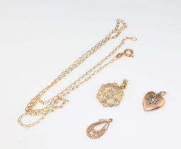 A 9ct yellow gold necklace 44cm, 2 pendants and a heart locket, 4.4 grams