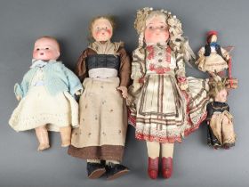 A collection of 5 Victorian and later dolls to include 2 paper mache 34cm l, 1 bisque Armand