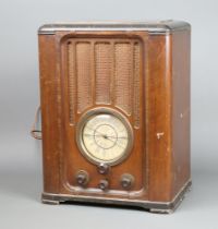 A Pilot U255 wood veneered valve radio, complete with backSome surface scratches