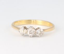 A yellow metal 3 stone diamond ring approx. 0.5ct, size P, 2.8 grams