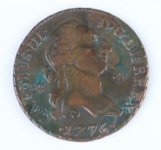 A Spanish copper coin of Charles III, dated 1776 with a value of 4 Maravedis