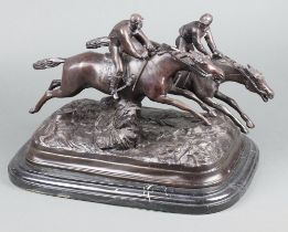 A 20th Century bronze figure group of 2 race horses, raised on an oval black marble base 25cm h x