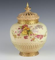 A Royal Worcester blush porcelain pot pourri and cover, the body decorated with spring flowers and