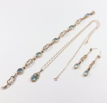 A 9ct yellow gold topaz set bracelet 18cm, a ditto pendant on chain 46cm, a bar brooch and a pair of