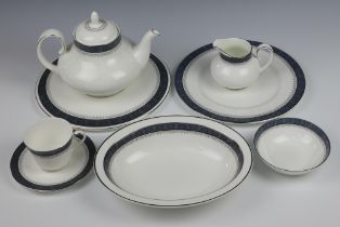 A Royal Doulton Sherbrooke tea and dinner service H5009 comprising 12 tea cups (7 seconds), 17