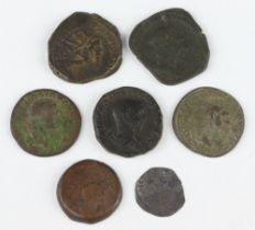 A collection of dupondius and other Roman coins dating from 100AD to 300AD