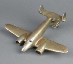 A chrome car mascot in the form of a 2 engined jet aircraft 19cm x 26cm