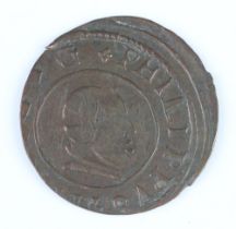 A Spanish copper coin of Philip IV dated 1663 with a value of 16 Maravedis, minted at Madrid