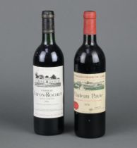 A bottle of 1978 Chateau Pave St Emillion 1er Grand Cru Classe together with a bottle of 1984