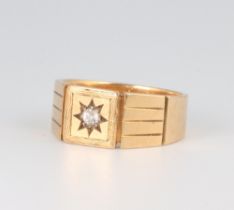 An 18ct yellow gold diamond set signet ring, diamond approx. 0.10ct, size R, 8.8 grams