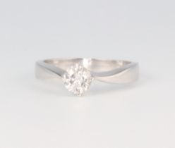 An 18ct white gold single stone diamond ring approx. 0.5ct, size L 1/2, 3.7 grams