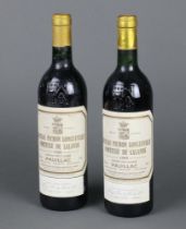 Two bottles of 1985 Chateau Pichon Longueville Comtesse de Lalande Grand Cru Pauillac red wine