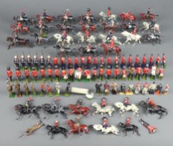A collection of Britains lead figures - Hussars, life guards, infantry including guardsmen