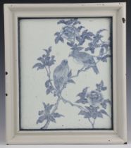 An 18th/19th Century Chinese blue and white tile decorated with birds amongst branches 25cm x 21cm