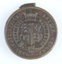 A one penny post brass letter weight dated 1839, minted by H Cooper on 12 August 1839 for post