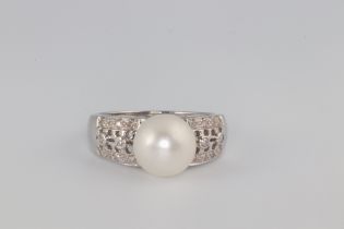 A white metal 14k cultured pearl and diamond ring, size P 1/2, 5 grams