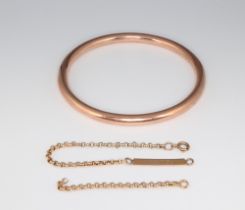 A 9ct yellow gold filled bangle and a 9ct identity bracelet (a/f), 19.7 grams gross