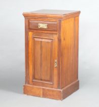 An Edwardian mahogany pot cupboard fitted a drawer above cupboard enclosed by panelled door, 94cm