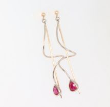 A pair of yellow metal pear cut ruby earrings 5.5cm, the rubies approx. 0.5ct each, 4.4 grams, 5.5cm