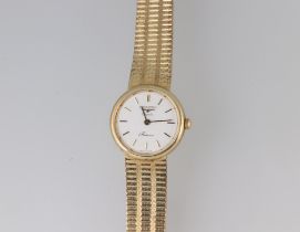 A lady's yellow metal 9ct Longines quartz Presence wristwatch and bracelet, the case numbered 24.