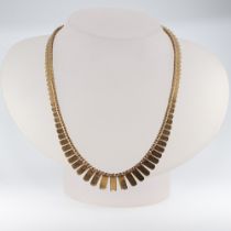 A 9ct yellow gold flat link tapered necklace 21.3 grams 40cm