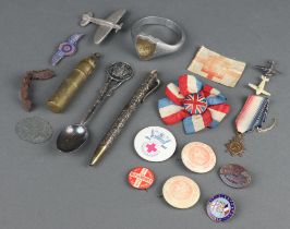 A gilt metal and enamelled triple alliance 1914 badge, a silver spoon marked Sargent's Mess Royal