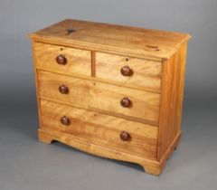 A Victorian bleached mahogany chest of 2 short and 2 long drawers with turned handles 88cm h x