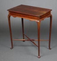 An Edwardian rectangular mahogany occasional table, raised on cabriole supports with X framed