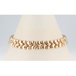 A yellow metal 9ct flat link bracelet, 23.5cm, 19.9 grams