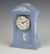 A Wedgwood jasperware blue timepiece dated 2000, decorated with classical dancer 21cm