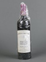 A bottle of 2004 Chateau Lascombes Margaux red wineThe wine is to mid of the neck