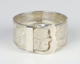 A Victorian style chased silver buckle bracelet, Birmingham 1993, 124 grams