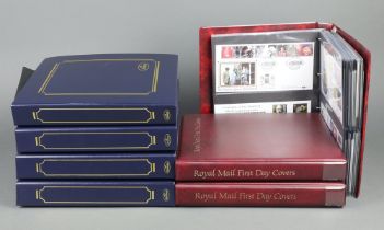 A collection of 555 Elizabeth II GB first day covers contained in 7 albums
